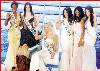 Pp 1 (360Wx259H) - Sara on stage with winers at MW 2006 Pageant Finals 